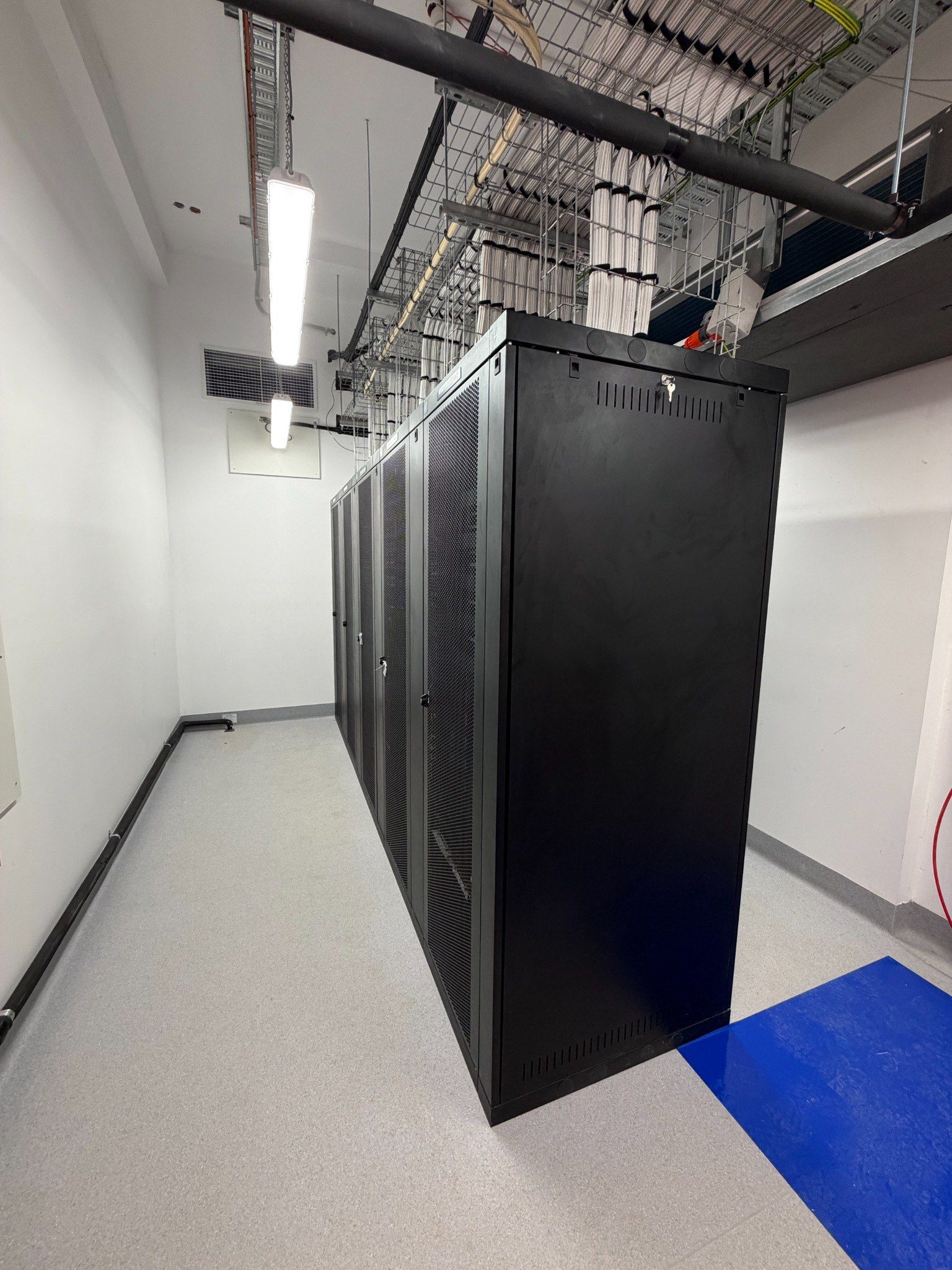 Completed communications room with professional cabling